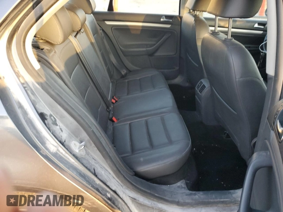 2009 Volkswagen Jetta z VIN 3VWAL71K09M133238, wystawiony jako Copart lot #81069654 z przebiegiem 153 617 mil mil oraz Szkoda całkowita • Salvage title. Historia ofert i sprzedaży dostępna na DreamBid. Obrazek 10.