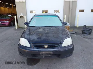 1999 Honda Civic HX with VIN 1HGEJ7120XL038544, listed as a IAAI auction lot 41425202 with 336,033 mi miles. Bid and sale history available at carsss.com. Image 12.