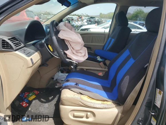 2005 Honda Odyssey EX-L with VIN 5FNRL38645B049087, listed as a Copart auction lot 56891275 with 194,587 mi miles and Salvage title. Bid and sale history available at DreamBid. Image 7.