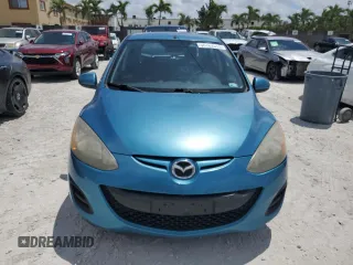 2011 Mazda 2 Sport with VIN JM1DE1HY0B0122590, listed as a Copart auction lot 56162515 with 140,847 mi miles and Clean Title. Bid and sale history available at DreamBid. Image 5.