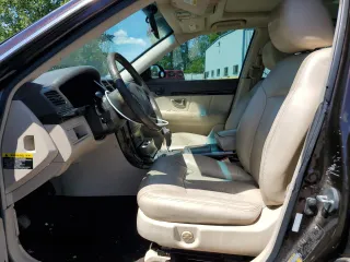 2008 Kia Amanti z VIN KNALD125085164330, wystawiony jako Copart lot #56377374 z przebiegiem 156 972 mil mil oraz Szkody całkowita. Historia ofert i sprzedaży dostępna na DreamBid. Obrazek 7.