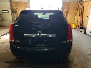 2014 Cadillac SRX Performance Collection z VIN 3GYFNFE31ES627978, wystawiony jako Copart lot #55437185 z przebiegiem 141 759 mil mil oraz Czysty tytuł • Clean title. Historia ofert i sprzedaży dostępna na DreamBid. Obrazek 6.