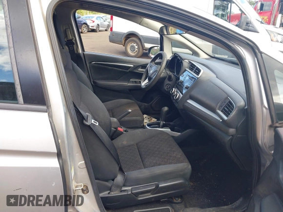 2015 Honda Fit LX with VIN 3HGGK5H58FM727710, listed as a IAAI auction lot 42208290 with 121,552 mi miles. Bid and sale history available at carsss.com. Image 5.