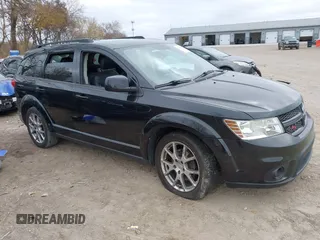 2013 Dodge Journey R/T with VIN 3C4PDDEG7DT591789, listed as a IAAI auction lot 40843769 with 188,001 mi miles and . Bid and sale history available at DreamBid. Image 1.