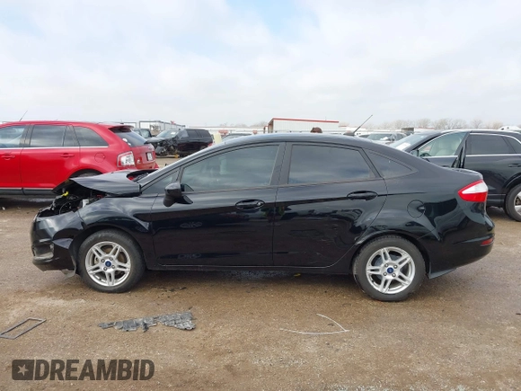 2019 Ford Fiesta SE z VIN 3FADP4BJ7KM158142, wystawiony jako IAAI lot #41510806 z przebiegiem 55 315 mil mil oraz . Historia ofert i sprzedaży dostępna na DreamBid. Obrazek 14.