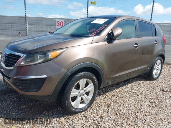 2013 Kia Sportage LX with VIN KNDPB3A24D7416706, listed as a IAAI auction lot 42525729 with 166,798 mi miles and . Bid and sale history available at DreamBid. Image 2.
