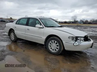 1999 Lincoln Continental with VIN 1LNHM97VXXY608466, listed as a Copart auction lot 45400935 with 155,333 mi miles and Salvage Title. Bid and sale history available at DreamBid. Image 4.