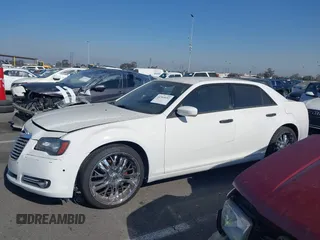 2014 Chrysler 300 S with VIN 2C3CCABG0EH235784, listed as a IAAI auction lot 41345692 with 109,920 mi miles and . Bid and sale history available at DreamBid. Image 14.