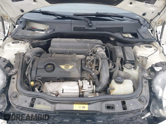 2013 MINI Coupe S with VIN WMWSX3C53DT466648, listed as a IAAI auction lot 41719597 with 106,936 mi miles and . Bid and sale history available at DreamBid. Image 10.