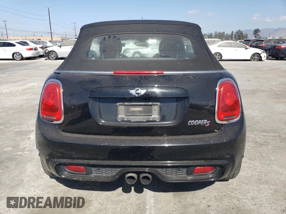 2016 MINI Convertible S z VIN WMWWG9C51G3C22038, wystawiony jako Copart lot #71986764 z przebiegiem 109 071 mil mil oraz Szkoda całkowita • Salvage title. Historia ofert i sprzedaży dostępna na DreamBid. Obrazek 6.