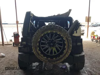 2016 Jeep Wrangler Unlimited Freedom с VIN 1C4BJWDG9GL319356, выставлен на аукционе IAAI как лот 42113994 с пробегом Не указан миль и . История ставок и продаж доступна на DreamBid. Изображение 16.