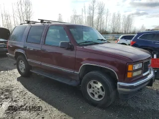 1998 GMC Yukon with VIN 1GKEK13R4WJ719517, listed as a Copart auction lot 44651715 with 230,062 mi miles and Clean Title. Bid and sale history available at carsss.com. Image 4.