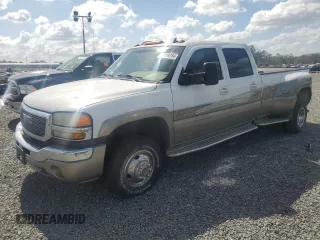 2006 GMC Sierra 3500 DRW Work Trk z VIN 1GTJK33236F128574, wystawiony jako Copart lot #77419284 z przebiegiem 167 538 mil mil oraz Szkody całkowita. Historia ofert i sprzedaży dostępna na DreamBid. Obrazek 1.