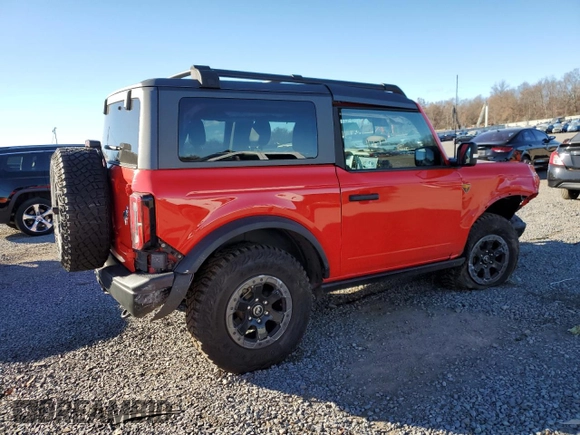 2021 Ford Bronco z VIN 1FMDE5CH3MLA60288, wystawiony jako Copart lot #79826644 z przebiegiem 12 451 mil mil oraz Szkoda całkowita • Salvage title. Historia ofert i sprzedaży dostępna na DreamBid. Obrazek 3.