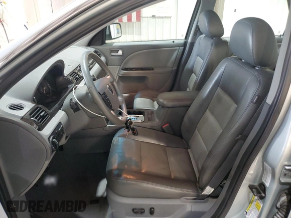 2006 Mercury Montego Premier z VIN 1MEHM42106G604182, wystawiony jako Copart lot #58371085 z przebiegiem 75 013 mil mil oraz Szkoda całkowita • Salvage title. Historia ofert i sprzedaży dostępna na DreamBid. Obrazek 7.