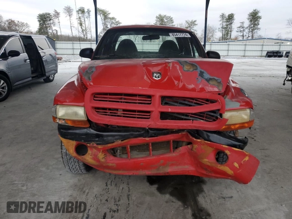 1999 Dodge Dakota SLT with VIN 1B7GG22Y5XS276472, listed as a Copart auction lot 85417774 with 264,833 mi miles and Salvage Title. Bid and sale history available at DreamBid. Image 5.