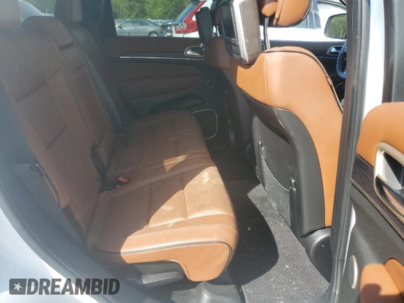 2015 Jeep Grand Cherokee Summit with VIN 1C4RJFJG3FC847797, listed as a Copart auction lot 54848085 with 53,506 mi miles and Salvage Title. Bid and sale history available at DreamBid. Image 11.