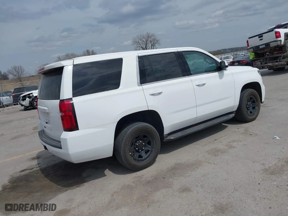 2020 Chevrolet Tahoe Commercial with VIN 1GNSKDEC9LR260983, listed as a IAAI auction lot 42062097 with 124,911 mi miles. Bid and sale history available at carsss.com. Image 4.