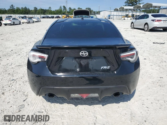 2014 Scion FR-S z VIN JF1ZNAA1XE8707871, wystawiony jako Copart lot #57945695 z przebiegiem 140 517 mil mil oraz Czysty tytuł • Clean title. Historia ofert i sprzedaży dostępna na DreamBid. Obrazek 6.
