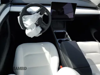 2024 Tesla Model Y Long Range с VIN 7SAYGDEE6RF149685, выставлен на аукционе Copart как лот 52986885 с пробегом Не указан миль и Списание • Salvage title. История ставок и продаж доступна на DreamBid. Изображение 8.