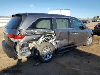 2016 Honda Odyssey SE with VIN 5FNRL5H39GB010435, listed as a Copart auction lot 48032595 with 141,955 mi miles and Salvage Title. Bid and sale history available at carsss.com. Image 3.