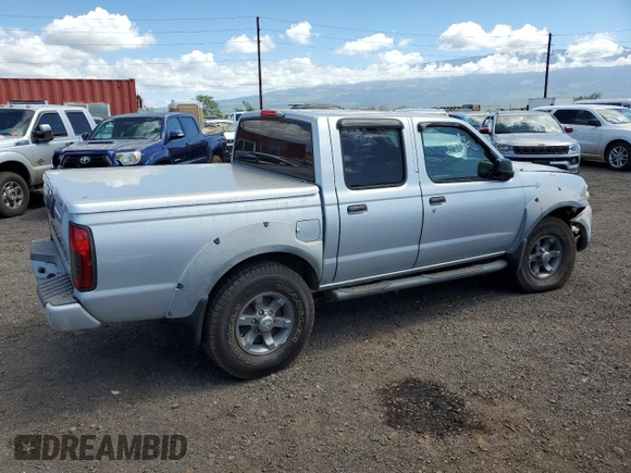 2002 Nissan Frontier SE with VIN 1N6ED27T12C300358, listed as a Copart auction lot 45379885 with 54,273 mi miles and Salvage title. Bid and sale history available at DreamBid. Image 3.