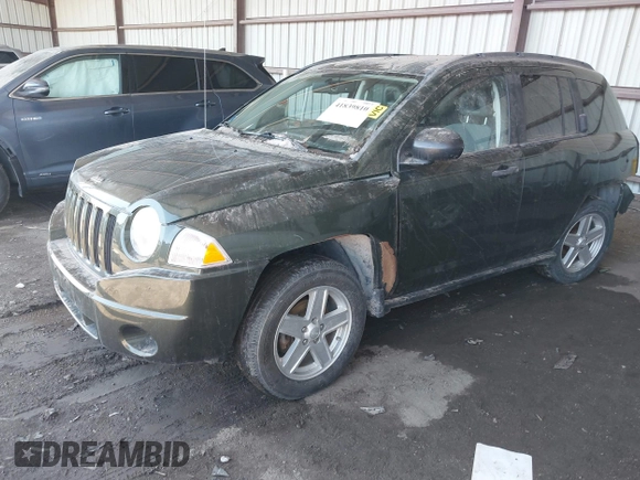 2007 Jeep Compass Sport with VIN 1J8FF47WX7D211695, listed as a IAAI auction lot 41839810 with 72,582 mi miles. Bid and sale history available at carsss.com. Image 17.