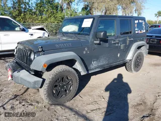2018 Jeep Wrangler JK Unlimited Sport S with VIN 1C4BJWDG3JL859373, listed as a IAAI auction lot 41599576 with 95,503 mi miles. Bid and sale history available at carsss.com. Image 17.