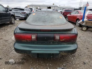 1993 Pontiac Firebird Firebird z VIN 2G2FS22S1P2201790, wystawiony jako Copart lot #79220434 z przebiegiem Nie podano mil oraz Czysty tytuł • Clean title. Historia ofert i sprzedaży dostępna na DreamBid. Obrazek 7.