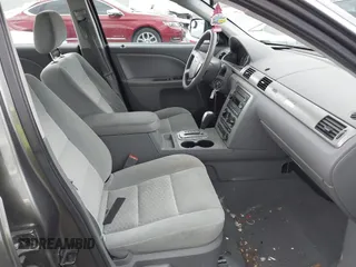 2006 Ford Five Hundred SE с VIN 1FAFP23146G154397, выставлен на аукционе IAAI как лот 42149486 с пробегом 156 008 миль миль и . История ставок и продаж доступна на DreamBid. Изображение 5.