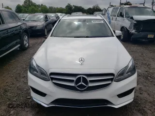 2014 Mercedes-Benz E 350 Luxury with VIN WDDHH8JBXEA803917, listed as a Copart auction lot 80199464 with 108,800 mi miles and Salvage Title. Bid and sale history available at DreamBid. Image 5.