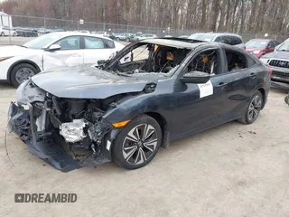2016 Honda Civic EX-L z VIN 19XFC1F73GE033247, wystawiony jako IAAI lot #41910941 z przebiegiem Nie podano mil oraz . Historia ofert i sprzedaży dostępna na DreamBid. Obrazek 2.