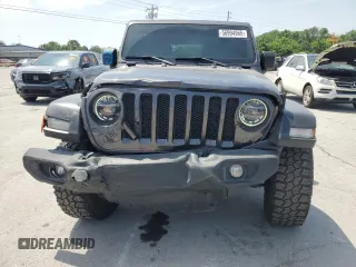 2020 Jeep Wrangler Unlimited Sport S z VIN 1C4HJXDG1LW340016, wystawiony jako Copart lot #56994965 z przebiegiem 38 259 mil mil oraz Szkoda całkowita • Salvage title. Historia ofert i sprzedaży dostępna na DreamBid. Obrazek 5.