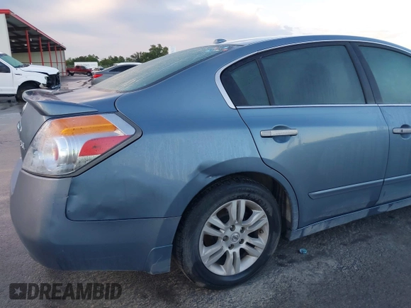 2010 Nissan Altima S with VIN 1N4AL2AP0AN512628, listed as a IAAI auction lot 42102865 with 184,235 mi miles and . Bid and sale history available at DreamBid. Image 6.