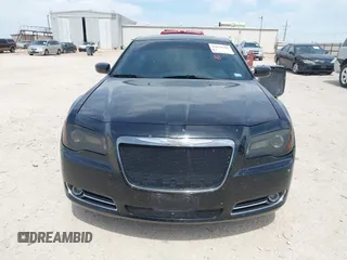 2014 Chrysler 300 S with VIN 2C3CCABG8EH376795, listed as a IAAI auction lot 42038260 with 134,265 mi miles and . Bid and sale history available at carsss.com. Image 12.
