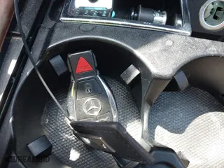 2012 Mercedes-Benz E-Class E 350 Luxury with VIN WDDHF8JB0CA614034, listed as a IAAI auction lot 42036672 with 65,049 mi miles. Bid and sale history available at carsss.com. Image 11.