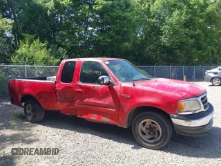 2002 Ford F-150 XL z VIN 1FTRX17212KB77969, wystawiony jako IAAI lot #42554893 z przebiegiem Nie podano mil oraz . Historia ofert i sprzedaży dostępna na DreamBid. Obrazek 13.