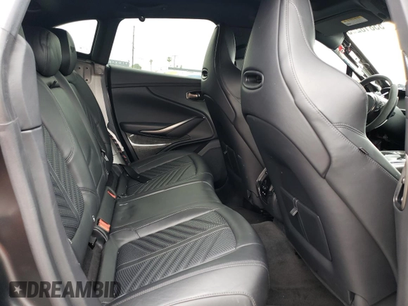 2023 Aston Martin DBX 707 z VIN SD7VUJBW2PTV06486, wystawiony jako Copart lot #55818283 z przebiegiem Nie podano mil oraz . Historia ofert i sprzedaży dostępna na DreamBid. Obrazek 11.