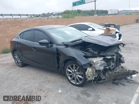2018 Mazda 3 Touring with VIN 3MZBN1V30JM201671, listed as a IAAI auction lot 42189105 with 174,284 mi miles and . Bid and sale history available at carsss.com. Image 1.
