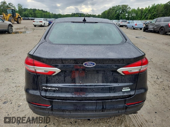 2020 Ford Fusion SEL with VIN 3FA6P0CD2LR115343, listed as a Copart auction lot 62756005 with 106,628 mi miles and Salvage title. Bid and sale history available at DreamBid. Image 6.