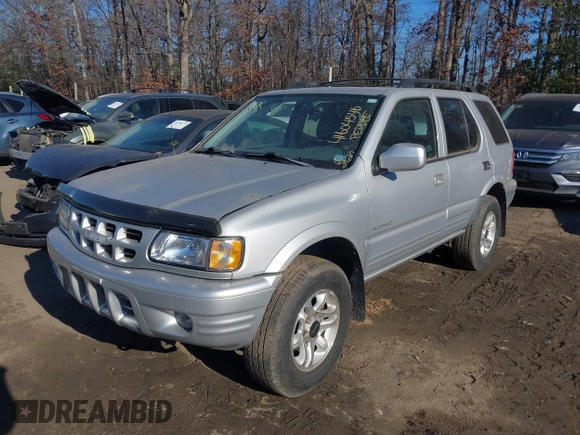 2002 Isuzu Rodeo z VIN 4S2DM58W524317574, wystawiony jako IAAI lot #41604546 z przebiegiem 150 000 mil mil oraz . Historia ofert i sprzedaży dostępna na DreamBid. Obrazek 2.