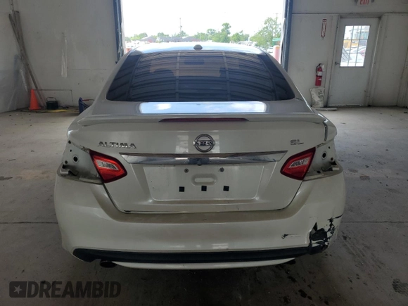2016 Nissan Altima SR z VIN 1N4AL3AP7GC199555, wystawiony jako Copart lot #57250315 z przebiegiem 210 826 mil mil oraz Szkoda całkowita • Salvage title. Historia ofert i sprzedaży dostępna na DreamBid. Obrazek 6.
