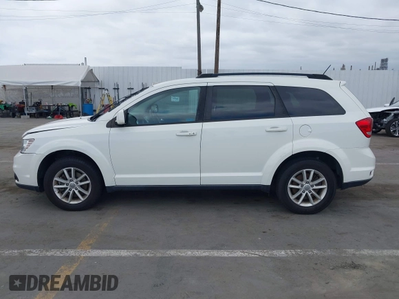 2015 Dodge Journey SXT with VIN 3C4PDDBG9FT606686, listed as a IAAI auction lot 42048201 with 107,593 mi miles and . Bid and sale history available at DreamBid. Image 14.