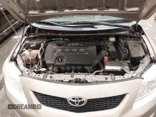 2010 Toyota Corolla with VIN 1NXBU4EE0AZ271333, listed as a IAAI auction lot 42308815 with 99,649 mi miles and . Bid and sale history available at DreamBid. Image 10.