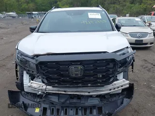 2023 Honda Passport Elite with VIN 5FNYF8H00PB022743, listed as a IAAI auction lot 42192958 with 25,165 mi miles and . Bid and sale history available at DreamBid. Image 12.