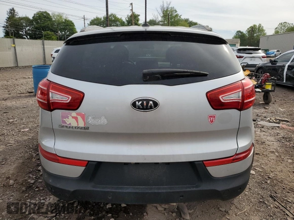 2012 Kia Sportage LX z VIN KNDPB3A29C7264856, wystawiony jako Copart lot #58397685 z przebiegiem 144 621 mil mil oraz Szkoda całkowita • Salvage title. Historia ofert i sprzedaży dostępna na DreamBid. Obrazek 6.