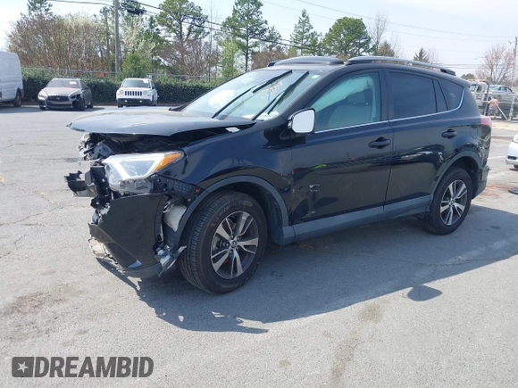 2018 Toyota RAV4 XLE with VIN 2T3RFREV6JW734993, listed as a IAAI auction lot 41790232 with 61,118 mi miles. Bid and sale history available at carsss.com. Image 16.
