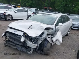 2017 Ford Fusion Titanium with VIN 3FA6P0K96HR105127, listed as a IAAI auction lot 39351701 with 103,295 mi miles. Bid and sale history available at carsss.com. Image 19.