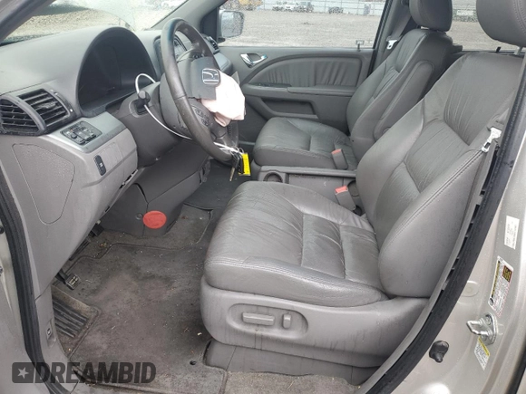 2008 Honda Odyssey EX-L with VIN 5FNRL38628B414581, listed as a Copart auction lot 52548104 with 236,692 mi miles and Salvage Title. Bid and sale history available at DreamBid. Image 7.