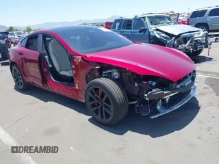 2023 Tesla Model S Plaid with VIN 5YJSA1E62PF510449, listed as a IAAI auction lot 42527915 with 28,904 mi miles and . Bid and sale history available at DreamBid. Image 1.